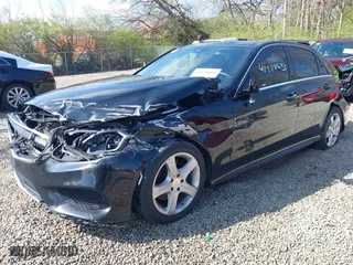 2015 Mercedes-Benz E-Class E 350 Luxury with VIN WDDHF8JB9FB111441, listed as a IAAI auction lot 41978693 with 167,079 mi miles. Bid and sale history available at carsss.com. Image 2.