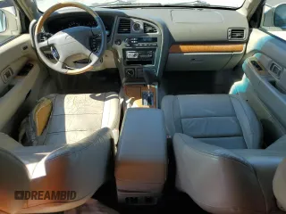 2001 Infiniti QX4 Luxury z VIN JNRDR07Y51W109670, wystawiony jako Copart lot #45500625 z przebiegiem 142 473 mil mil oraz Szkody całkowita. Historia ofert i sprzedaży dostępna na DreamBid. Obrazek 8.