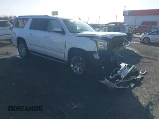 2016 GMC Yukon XL Denali with VIN 1GKS2HKJ9GR297531, listed as a IAAI auction lot 41586365 with 102,445 mi miles. Bid and sale history available at carsss.com. Image 1.