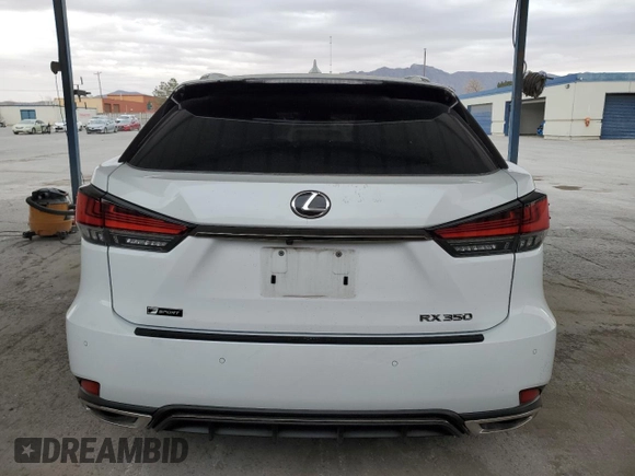 2020 Lexus RX with VIN 2T2YZMDA6LC250402, listed as a Copart auction lot 87664115 with 103,534 mi miles and Salvage Title. Bid and sale history available at carsss.com. Image 6.