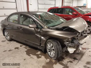 2010 Honda Civic Sdn EX with VIN 19XFA1F87AE041082, listed as a IAAI auction lot 41855118 with 154,243 mi miles. Bid and sale history available at carsss.com. Image 1.
