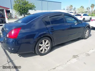 2004 Nissan Maxima SL with VIN 1N4BA41E64C861846, listed as a IAAI auction lot 41911687 with 218,668 mi miles. Bid and sale history available at carsss.com. Image 4.