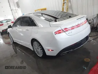 2017 Lincoln MKZ Hybrid Reserve with VIN 3LN6L5MU0HR603355, listed as a IAAI auction lot 41720619 with 142,241 mi miles. Bid and sale history available at carsss.com. Image 3.