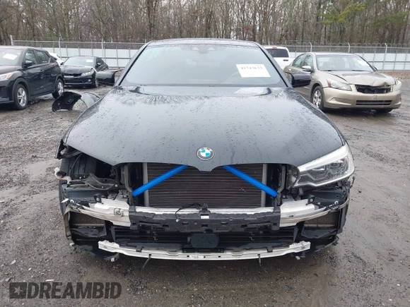 2018 BMW 5 Series M550i xDrive with VIN WBAJB9C59JB049114, listed as a IAAI auction lot 41543633 with 87,942 mi miles and . Bid and sale history available at carsss.com. Image 13.