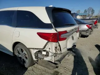 2018 Honda Odyssey Touring с VIN 5FNRL6H8XJB002031, выставлен на аукционе Copart как лот 49996105 с пробегом 202 284 миль миль и Чистый • Clean title. История ставок и продаж доступна на DreamBid. Изображение 12.