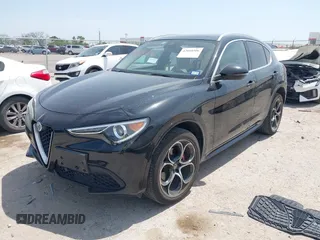 2020 Alfa Romeo Stelvio Ti z VIN ZASPAKBN8L7C95979, wystawiony jako IAAI lot #42018506 z przebiegiem 30 198 mil mil oraz . Historia ofert i sprzedaży dostępna na DreamBid. Obrazek 2.