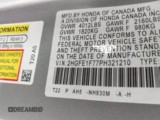 2023 Honda Civic EX with VIN 2HGFE1F77PH321210, listed as a IAAI auction lot 41797011 with 8,748 mi miles and . Bid and sale history available at DreamBid. Image 9.
