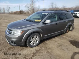 2012 Dodge Journey SXT z VIN 3C4PDCCGXCT177675, wystawiony jako Copart lot #52396045 z przebiegiem 168 203 mil mil oraz Szkoda całkowita • Salvage title. Historia ofert i sprzedaży dostępna na DreamBid. Obrazek 1.