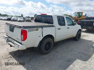 2018 Nissan Frontier SV with VIN 1N6AD0EV0JN744809, listed as a IAAI auction lot 42508839 with 99,049 mi miles and . Bid and sale history available at DreamBid. Image 4.