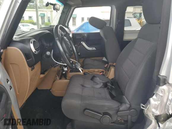 2011 Jeep Wrangler Sahara with VIN 1J4AA5D13BL546742, listed as a Copart auction lot 56415765 with 60,454 mi miles and Salvage title. Bid and sale history available at DreamBid. Image 7.