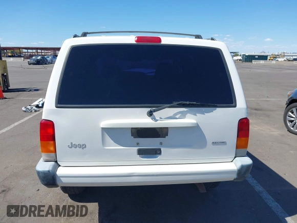 2000 Jeep Cherokee z VIN 1J4FF48S3YL236054, wystawiony jako IAAI lot #42217775 z przebiegiem 192 826 mil mil oraz . Historia ofert i sprzedaży dostępna na DreamBid. Obrazek 16.