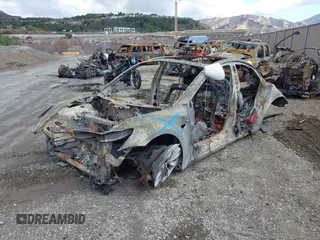 2018 Tesla Model 3 Long Range Battery with VIN 5YJ3E1EB5JF100466, listed as a IAAI auction lot 41413723 with Not Provided miles and . Bid and sale history available at DreamBid. Image 2.