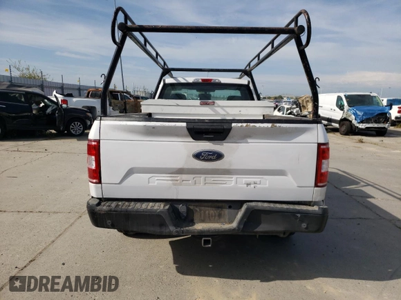 2020 Ford F-150 XL with VIN 1FTMF1CB3LKD51612, listed as a Copart auction lot 52724055 with 147,261 mi miles and Salvage title. Bid and sale history available at DreamBid. Image 6.