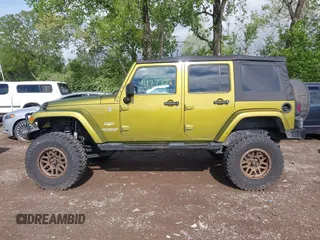 2008 Jeep Wrangler Unlimited Sahara with VIN 1J4GA59148L545255, listed as a IAAI auction lot 42177758 with 155,953 mi miles and . Bid and sale history available at DreamBid. Image 15.