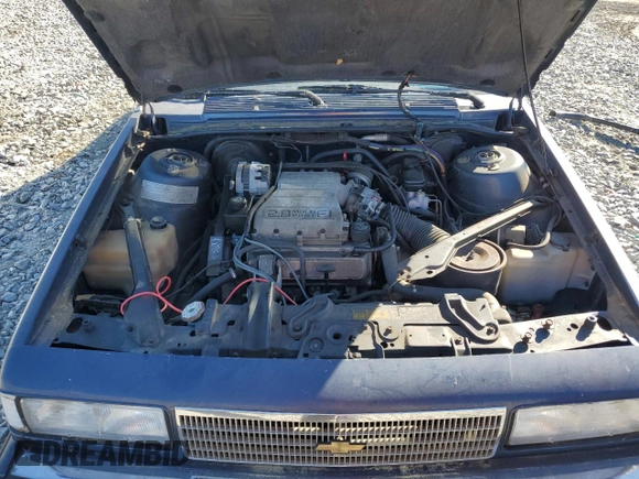1989 Chevrolet Celebrity z VIN 1G1AW51W8K6185894, wystawiony jako Copart lot #75610854 z przebiegiem 111 268 mil mil oraz Czysty tytuł • Clean title. Historia ofert i sprzedaży dostępna na DreamBid. Obrazek 11.