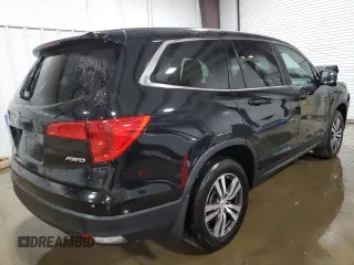 2017 Honda Pilot EX-L with VIN 5FNYF6H55HB096659, listed as a Copart auction lot 60426095 with 144,047 mi miles and Salvage title. Bid and sale history available at DreamBid. Image 3.