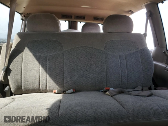 1999 GMC Safari z VIN 1GKDM19WXXB512466, wystawiony jako Copart lot #48068505 z przebiegiem 179 526 mil mil oraz Szkody całkowita. Historia ofert i sprzedaży dostępna na DreamBid. Obrazek 11.