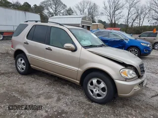 2003 Mercedes-Benz M-Class 3.2L with VIN 4JGAB54E43A383811, listed as a IAAI auction lot 41204136 with 209,327 mi miles. Bid and sale history available at carsss.com. Image 1.