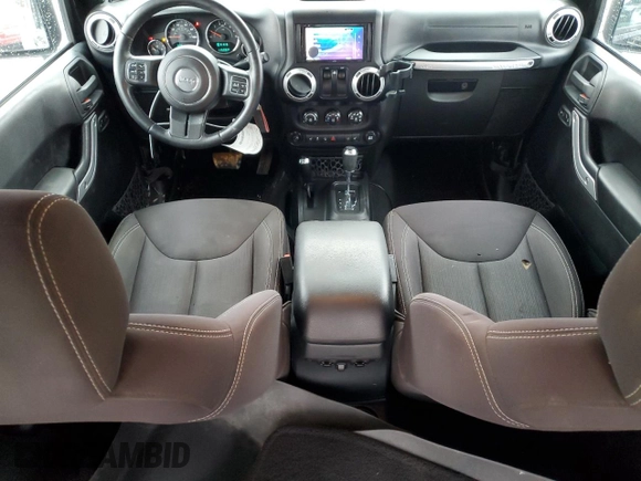 2014 Jeep Wrangler Sahara with VIN 1C4AJWBG0EL306703, listed as a Copart auction lot 51450215 with 115,932 mi miles and Salvage Title. Bid and sale history available at DreamBid. Image 8.