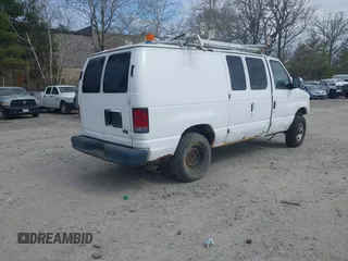 2011 Ford Econoline Cargo Commercial with VIN 1FTNE2EL0BDB36890, listed as a IAAI auction lot 42049933 with Not Provided miles. Bid and sale history available at carsss.com. Image 4.