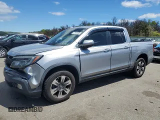 2017 Honda Ridgeline RTL-T z VIN 5FPYK3F65HB012868, wystawiony jako Copart lot #57562885 z przebiegiem 115 530 mil mil oraz Szkoda całkowita • Salvage title. Historia ofert i sprzedaży dostępna na DreamBid. Obrazek 1.