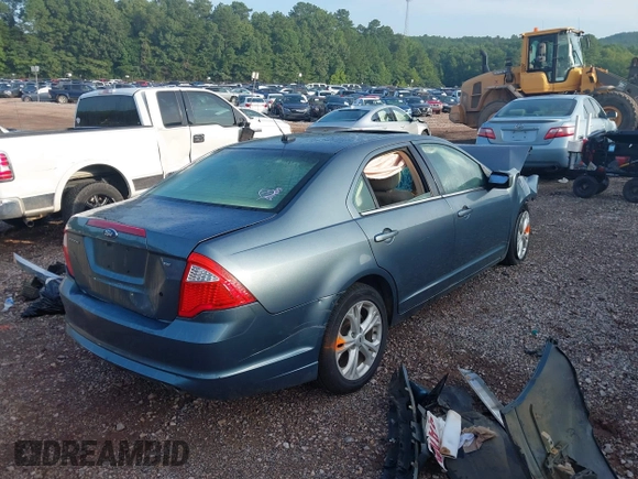 2012 Ford Fusion SE z VIN 3FAHP0HA7CR107455, wystawiony jako IAAI lot #39979687 z przebiegiem 157 764 mil mil oraz . Historia ofert i sprzedaży dostępna na DreamBid. Obrazek 4.