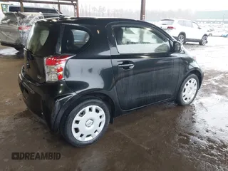 2013 Scion iQ with VIN JTNJJXB08DJ024825, listed as a IAAI auction lot 41842818 with 91,136 mi miles and . Bid and sale history available at DreamBid. Image 4.