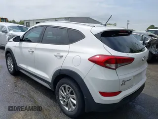 2017 Hyundai Tucson SE z VIN KM8J33A40HU383601, wystawiony jako IAAI lot #41947577 z przebiegiem 92 722 mil mil oraz . Historia ofert i sprzedaży dostępna na DreamBid. Obrazek 3.