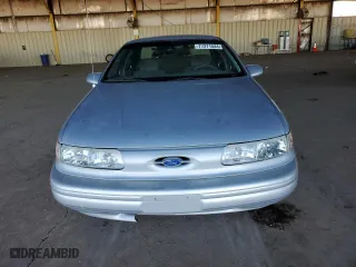 1995 Ford Taurus GL with VIN 1FALP524XSG154141, listed as a Copart auction lot 77271544 with 72,118 mi miles and Clean Title. Bid and sale history available at carsss.com. Image 5.