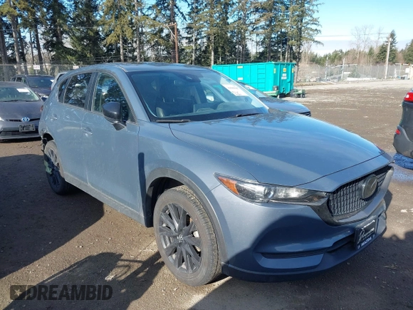 2021 Mazda CX-5 Touring with VIN JM3KFACM6M0483194, listed as a IAAI auction lot 41503907 with 41,237 mi miles. Bid and sale history available at carsss.com. Image 1.