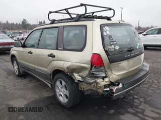2003 Subaru Forester XS with VIN JF1SG65663H753306, listed as a IAAI auction lot 41311689 with 253,269 mi miles. Bid and sale history available at carsss.com. Image 3.