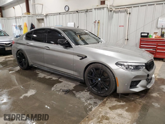 2019 BMW M5 with VIN WBSJF0C50KB447597, listed as a Copart auction lot 45179115 with 40,600 mi miles and Salvage Title. Bid and sale history available at carsss.com. Image 4.