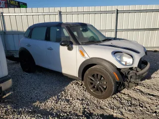 2013 MINI Cooper Countryman with VIN WMWZB3C5XDWR35519, listed as a Copart auction lot 82826894 with 89,832 mi miles and Salvage Title. Bid and sale history available at carsss.com. Image 4.