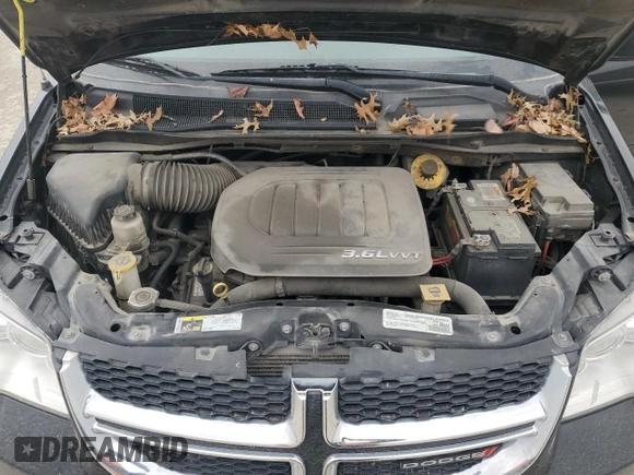 2017 Dodge Grand Caravan SE with VIN 2C4RDGBG3HR741842, listed as a Copart auction lot 49535695 with 211,169 mi miles and Clean Title. Bid and sale history available at DreamBid. Image 12.