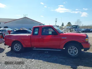 2011 Ford Ranger XLT with VIN 1FTLR4FE5BPA57057, listed as a IAAI auction lot 41995162 with 238,987 mi miles. Bid and sale history available at carsss.com. Image 13.