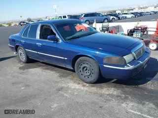 2004 Mercury Grand Marquis GS with VIN 2MEFM74W94X632233, listed as a IAAI auction lot 42051360 with 167,654 mi miles. Bid and sale history available at carsss.com. Image 1.
