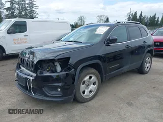 2019 Jeep Cherokee Latitude with VIN 1C4PJMCX9KD255382, listed as a IAAI auction lot 41903951 with 139,741 mi miles. Bid and sale history available at carsss.com. Image 2.