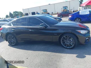 2016 Infiniti Q50 Red Sport 400 with VIN JN1FV7AR4GM451987, listed as a IAAI auction lot 41891826 with 64,931 mi miles and . Bid and sale history available at DreamBid. Image 13.