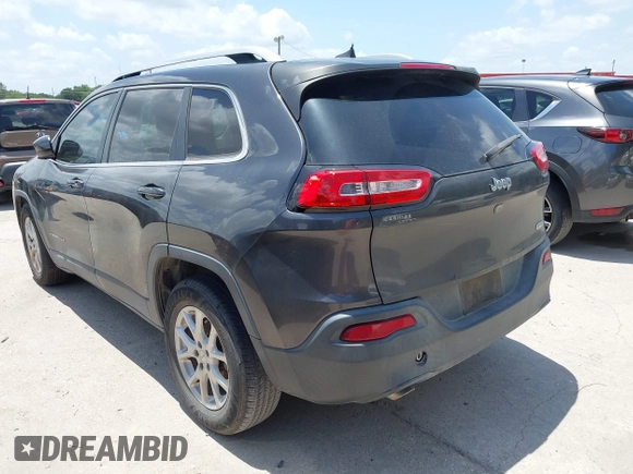 2016 Jeep Cherokee Latitude with VIN 1C4PJLCBXGW265431, listed as a IAAI auction lot 42542328 with 127,249 mi miles and . Bid and sale history available at DreamBid. Image 3.
