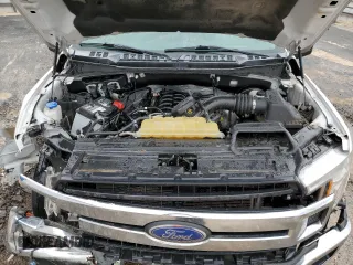 2020 Ford F-150 XL z VIN 1FTEW1C55LFA63257, wystawiony jako Copart lot #59329965 z przebiegiem 115 740 mil mil oraz Czysty tytuł • Clean title. Historia ofert i sprzedaży dostępna na DreamBid. Obrazek 11.