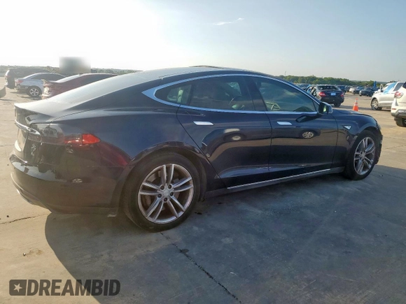 2014 Tesla Model S 60 с VIN 5YJSA1H16EFP50018, выставлен на аукционе Copart как лот 64372605 с пробегом 165 910 миль миль и Списание • Salvage title. История ставок и продаж доступна на DreamBid. Изображение 3.