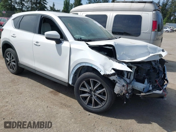 2018 Mazda CX-5 Grand Touring with VIN JM3KFBDM1J0309260, listed as a IAAI auction lot 42247237 with Not Provided miles and . Bid and sale history available at DreamBid. Image 1.