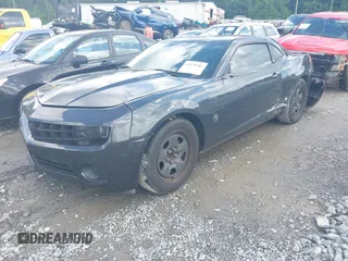 2013 Chevrolet Camaro LS z VIN 2G1FA1E39D9206888, wystawiony jako IAAI lot #42170703 z przebiegiem 169 661 mil mil oraz . Historia ofert i sprzedaży dostępna na DreamBid. Obrazek 22.