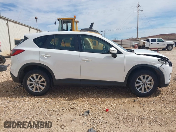 2016 Mazda CX-5 Sport with VIN JM3KE2BYXG0683318, listed as a IAAI auction lot 41777751 with 116,922 mi miles. Bid and sale history available at carsss.com. Image 13.