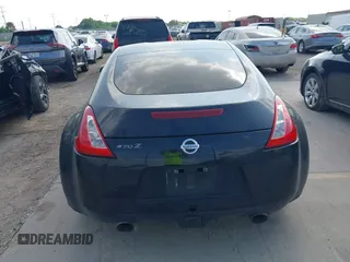 2015 Nissan 370Z z VIN JN1AZ4EH2FM442556, wystawiony jako IAAI lot #41956287 z przebiegiem 128 769 mil mil oraz . Historia ofert i sprzedaży dostępna na DreamBid. Obrazek 17.