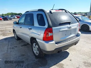 2009 Kia Sportage LX with VIN KNDJF724X97556574, listed as a IAAI auction lot 42206080 with 115,868 mi miles and . Bid and sale history available at carsss.com. Image 3.