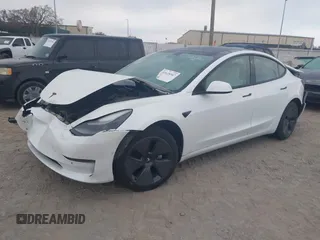2022 Tesla Model 3 Long Range z VIN 5YJ3E1EB9NF115364, wystawiony jako IAAI lot #41618947 z przebiegiem 58 196 mil mil oraz . Historia ofert i sprzedaży dostępna na DreamBid. Obrazek 16.