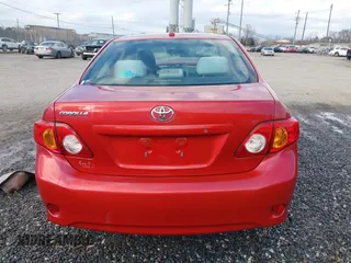 2010 Toyota Corolla with VIN 2T1BU4EE2AC309033, listed as a IAAI auction lot 41521887 with 305,228 mi miles. Bid and sale history available at carsss.com. Image 16.