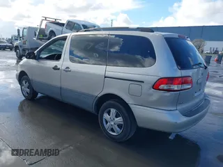2002 Toyota Sienna CE with VIN 4T3ZF19C72U478049, listed as a IAAI auction lot 41677760 with 234,022 mi miles. Bid and sale history available at carsss.com. Image 3.