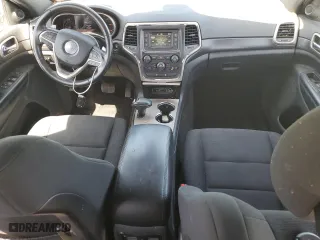 2015 Jeep Grand Cherokee Laredo with VIN 1C4RJFAG9FC905931, listed as a Copart auction lot 52259525 with 131,438 mi miles and Salvage Title. Bid and sale history available at carsss.com. Image 8.